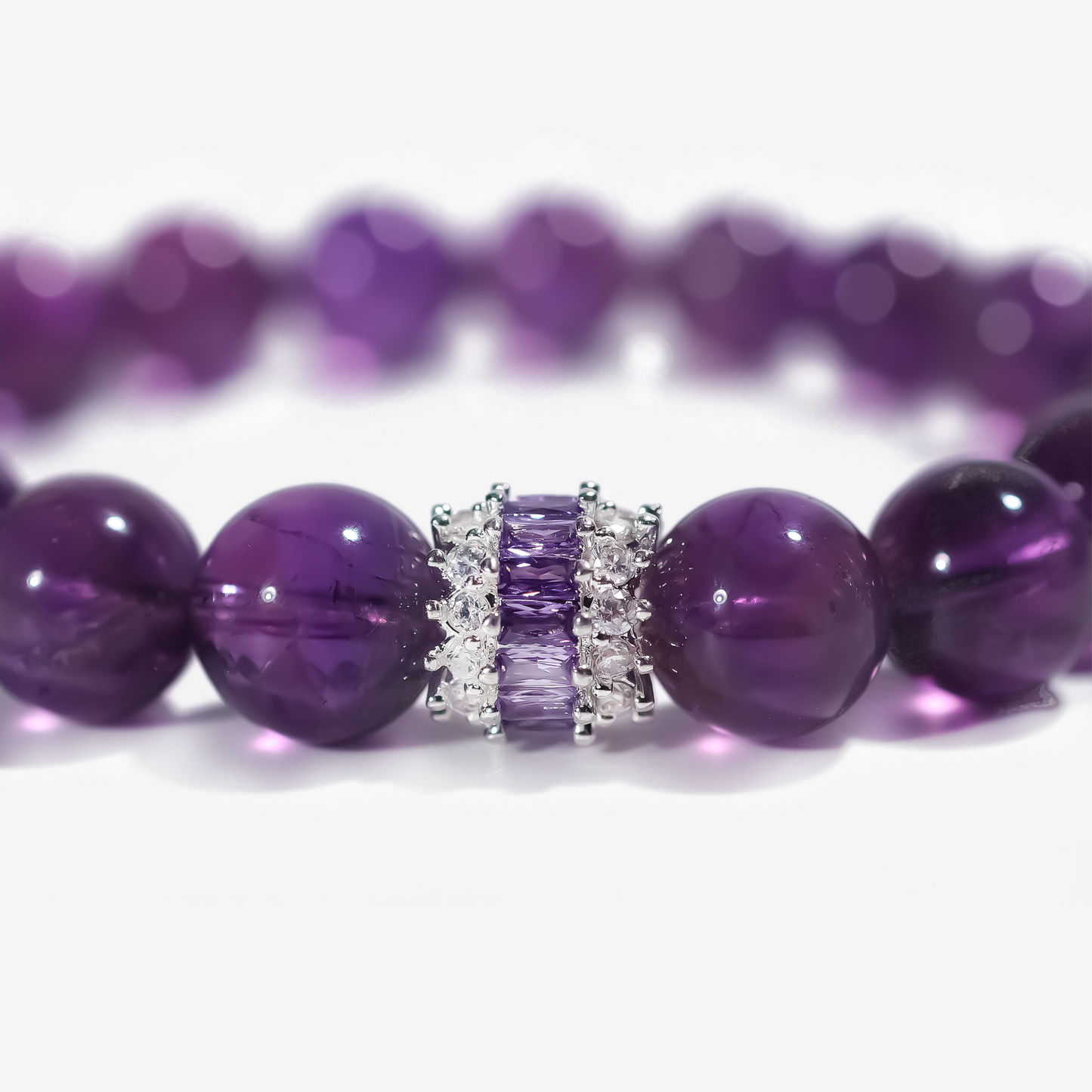 Close-up of JWPatronus Royal Amethyst Bracelet with silver and amethyst accents