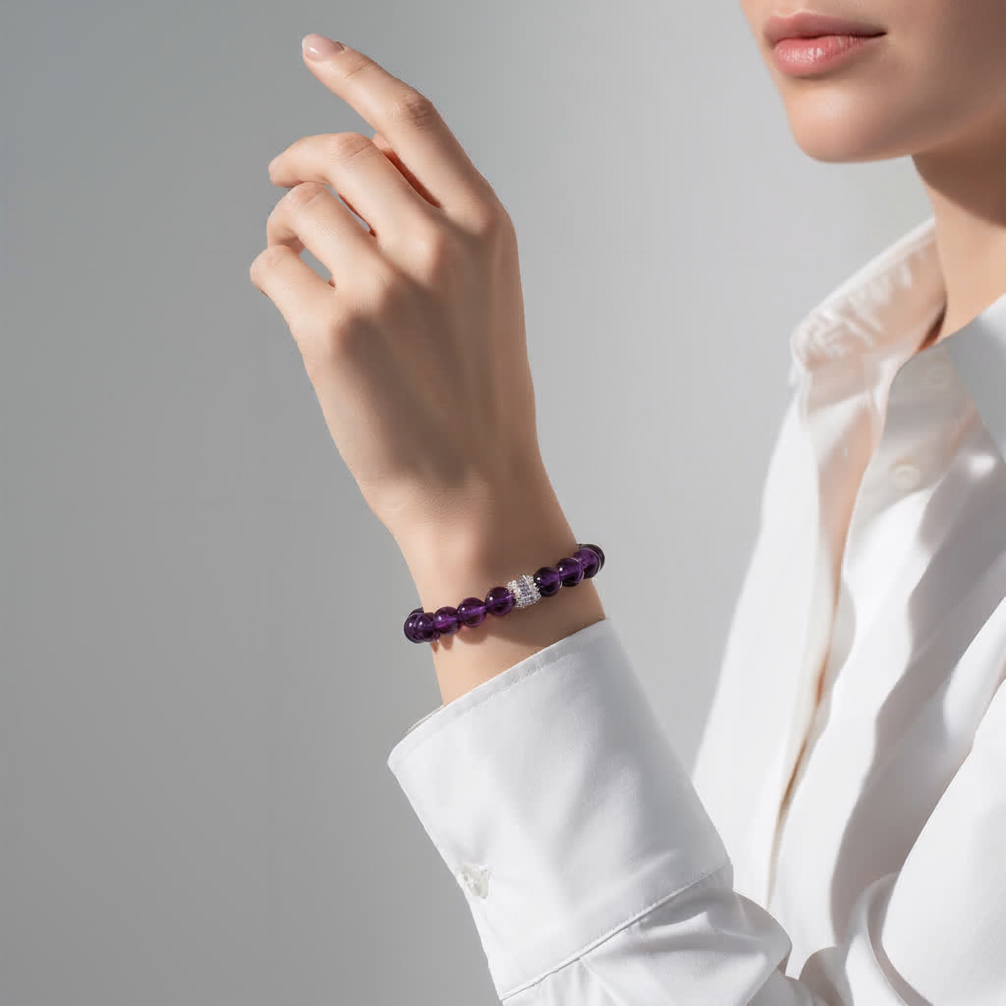 JWPatronus Amethyst Bracelet on hand – showcases deep purple glow and elegance