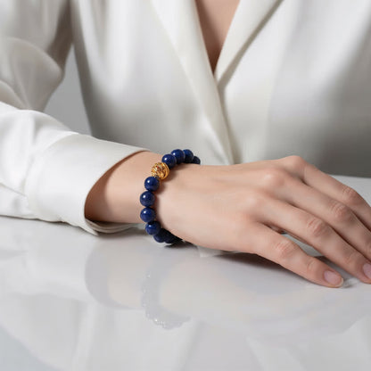 Golden Lucky Lapis Bracelet – 0.39-inch (10mm) deep-blue Lapis Lazuli beads with 14k gold-plated transformation bead, symbol of wisdom and good fortune by JWPatronus