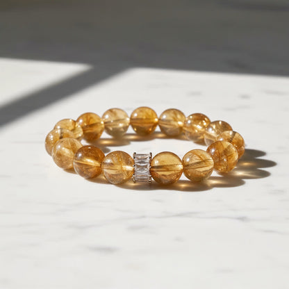 Citrine crystal bracelet detail showing warm golden hue and natural inner patterns