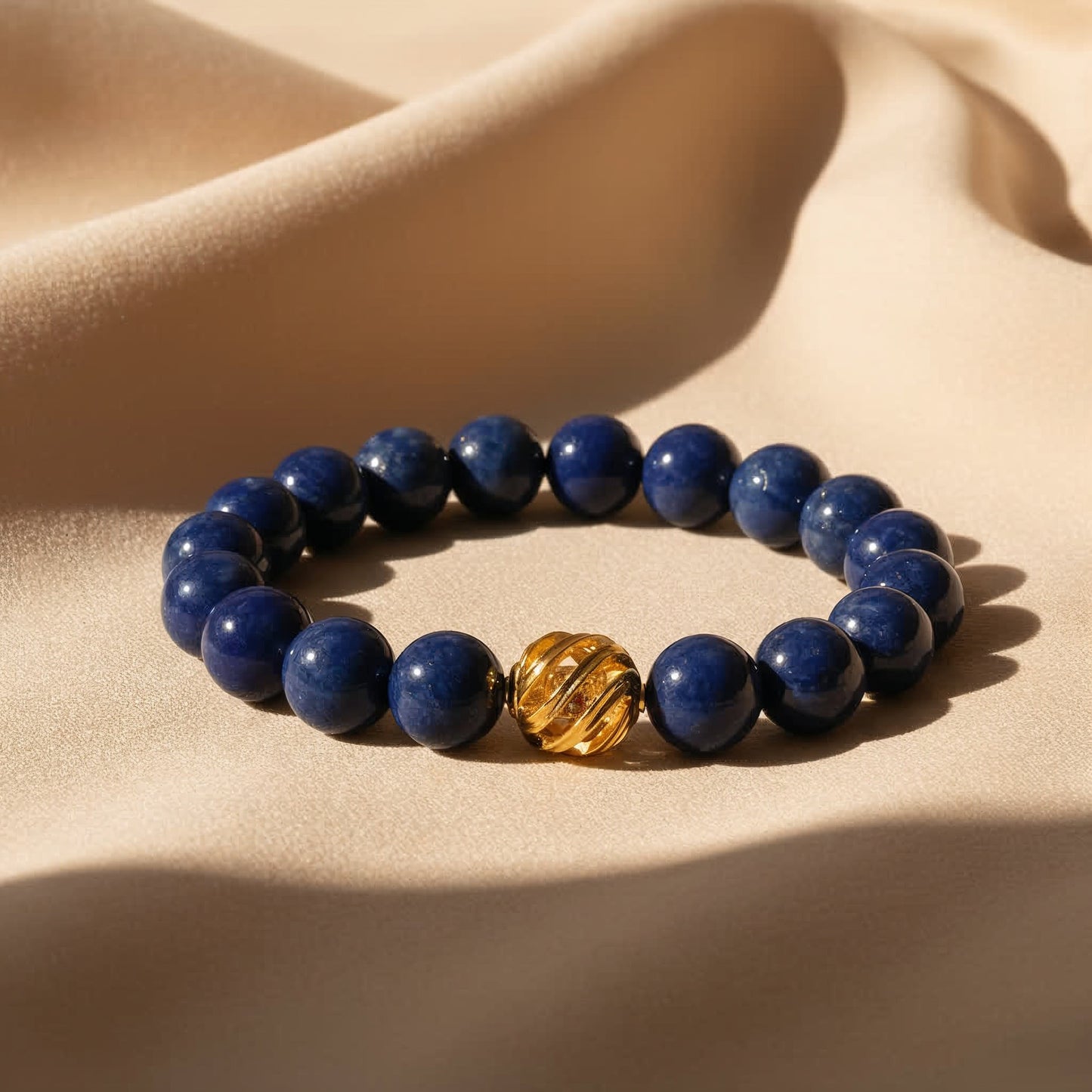 Golden Lucky Lapis Bracelet – 0.39-inch (10mm) deep-blue Lapis Lazuli beads with 14k gold-plated transformation bead, symbol of wisdom and good fortune by JWPatronus