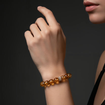 Brazilian citrine gemstone bracelet side view – smooth round beads on stretch cord