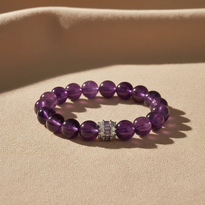 JWPatronus Royal Amethyst Bracelet on fabric surface – luxury crystal photography