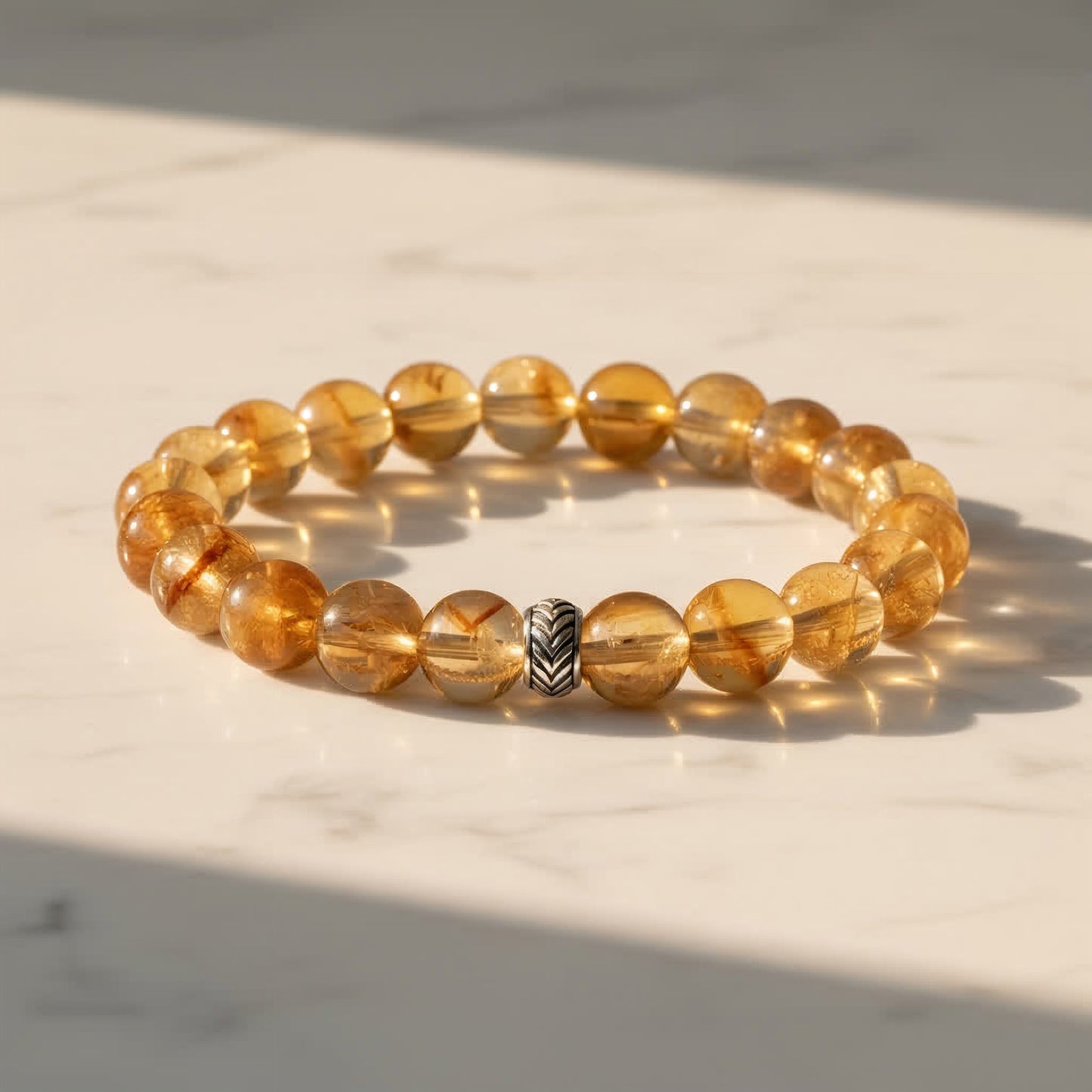 Sterling silver and citrine gemstone bracelet flat lay