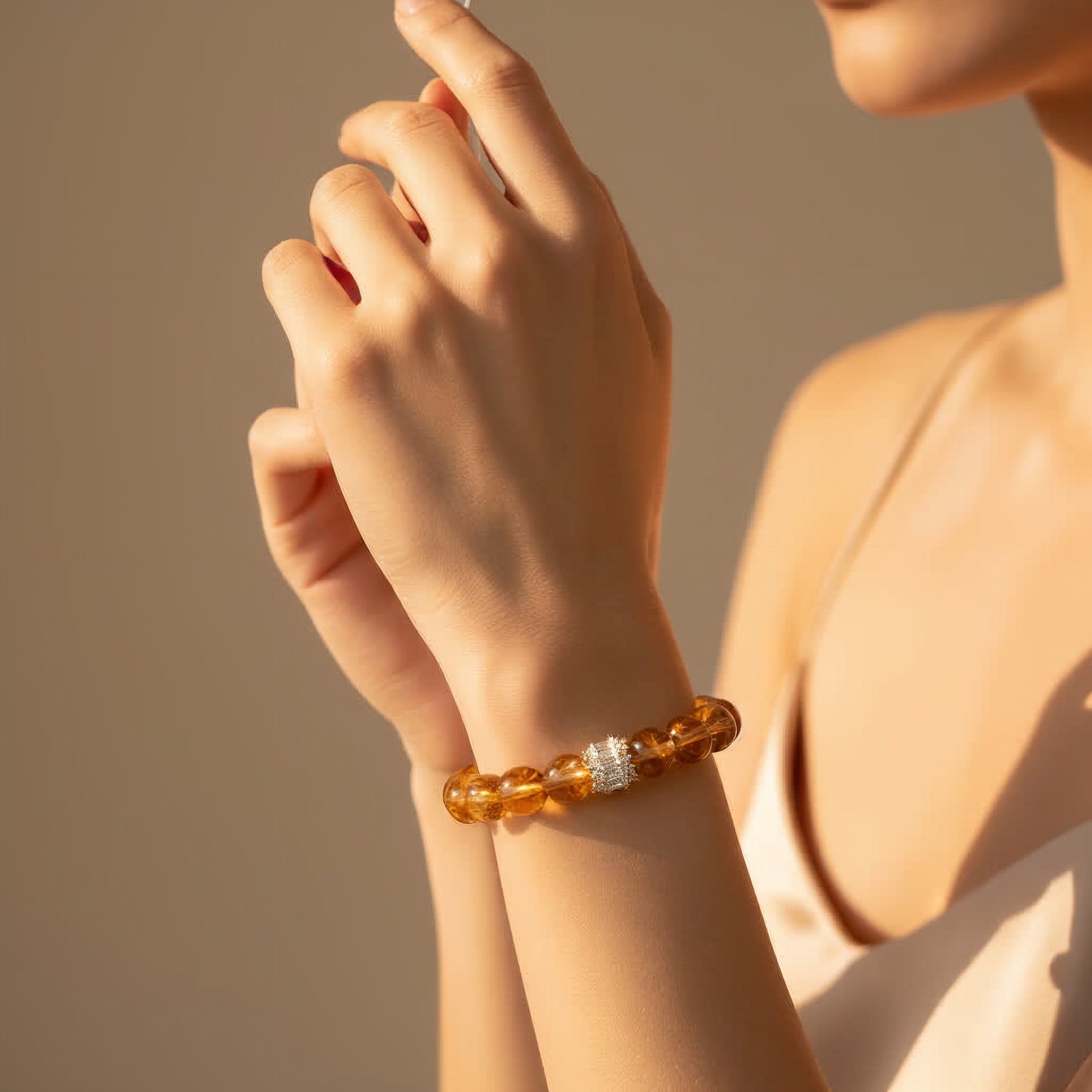 Handmade citrine bracelet on wrist – bold golden beaded jewelry