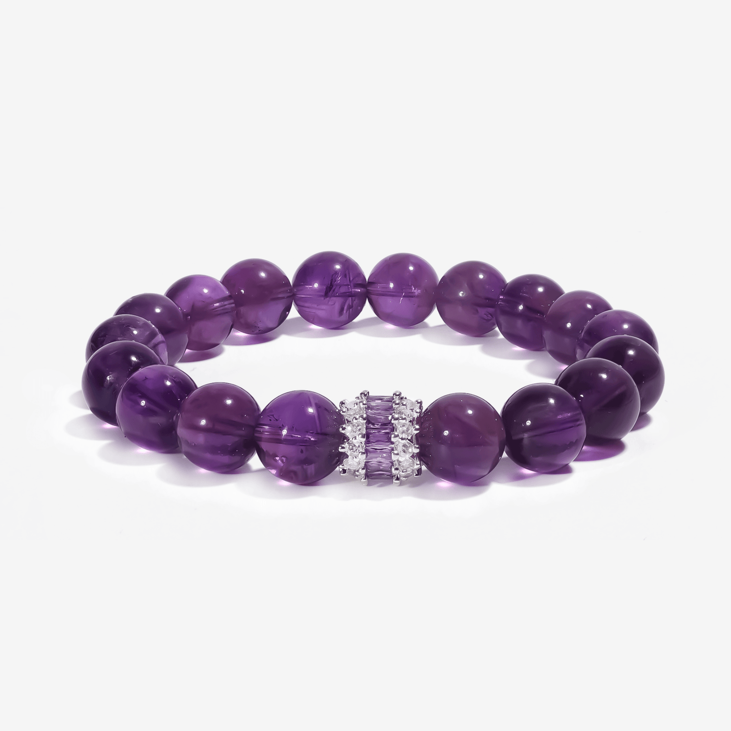 natural Sri Lankan amethyst healing bracelet with polished purple crystal beads and silver centerpiece