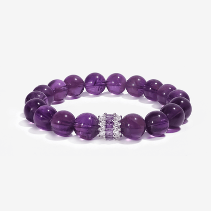 natural Sri Lankan amethyst healing bracelet with polished purple crystal beads and silver centerpiece