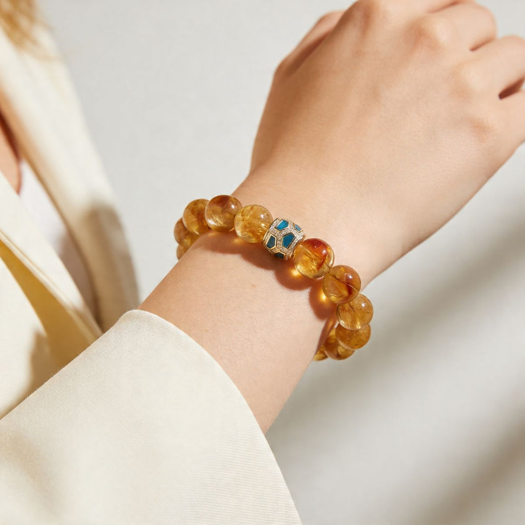 Amber Glow Citrine Bracelet worn on wrist with warm golden beads and Green Agate detail