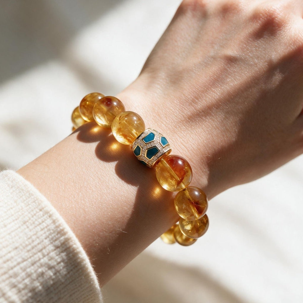 Amber Glow Citrine Bracelet styled with a cream knit sleeve for polished everyday wear.