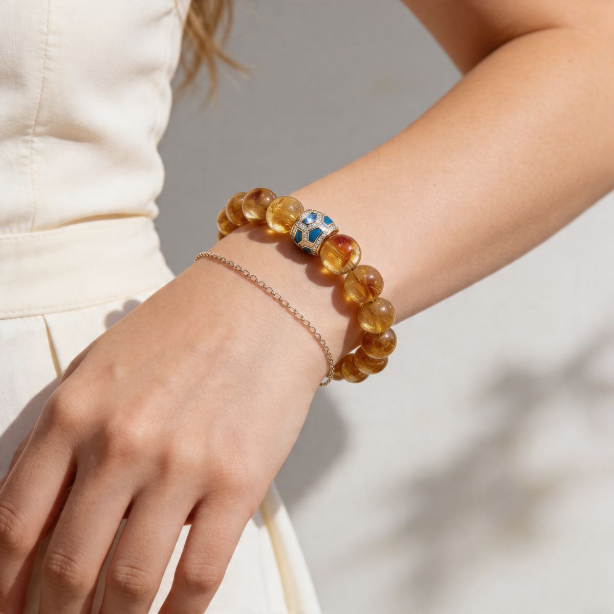 Natural Brazilian Citrine beaded bracelet worn on wrist with elegant warm golden tones
