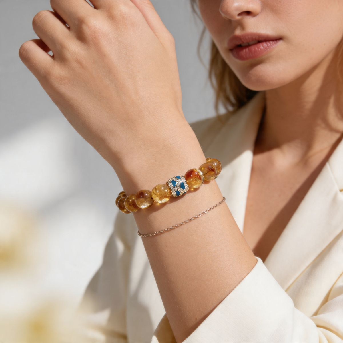 Citrine bracelet for women styled with soft neutral outfit and golden gemstone beads