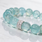Close-up of the Silver Halo centerpiece and hand-polished natural aquamarine beads