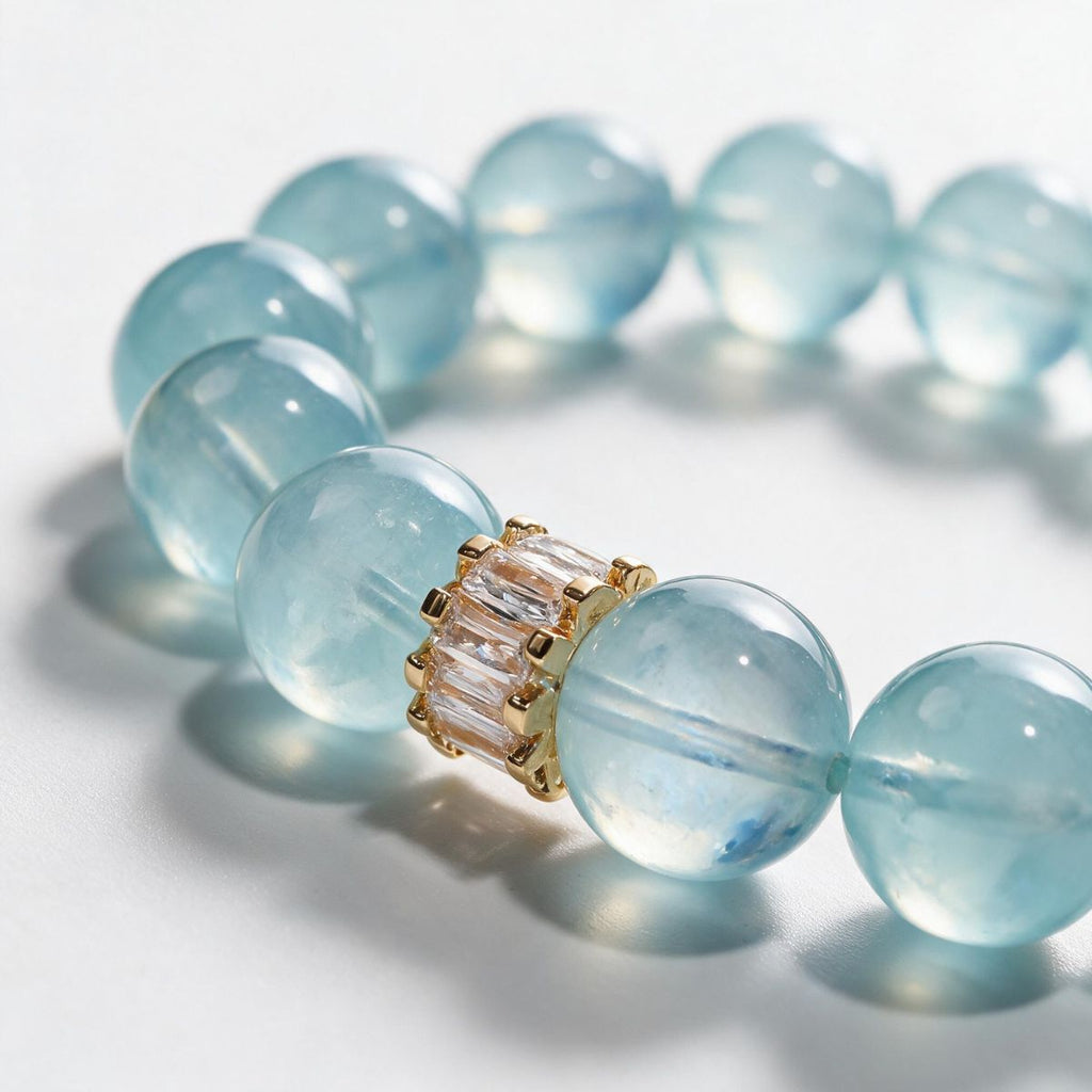 Close-up of the Gold Baguette centerpiece and natural aquamarine beads on the Blue Horizon bracelet