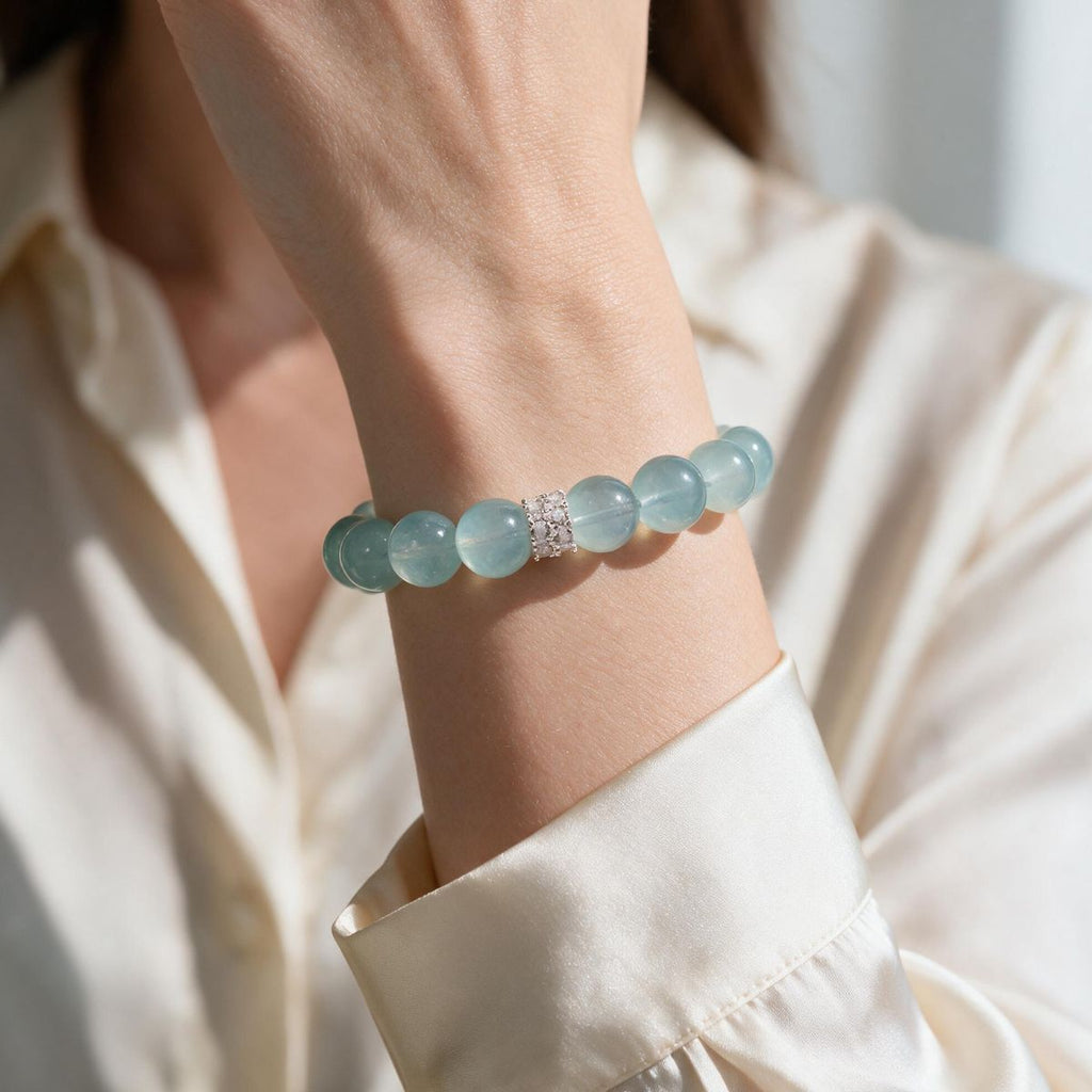 Blue Horizon Silver Halo aquamarine bracelet styled with a cream blazer for everyday wear