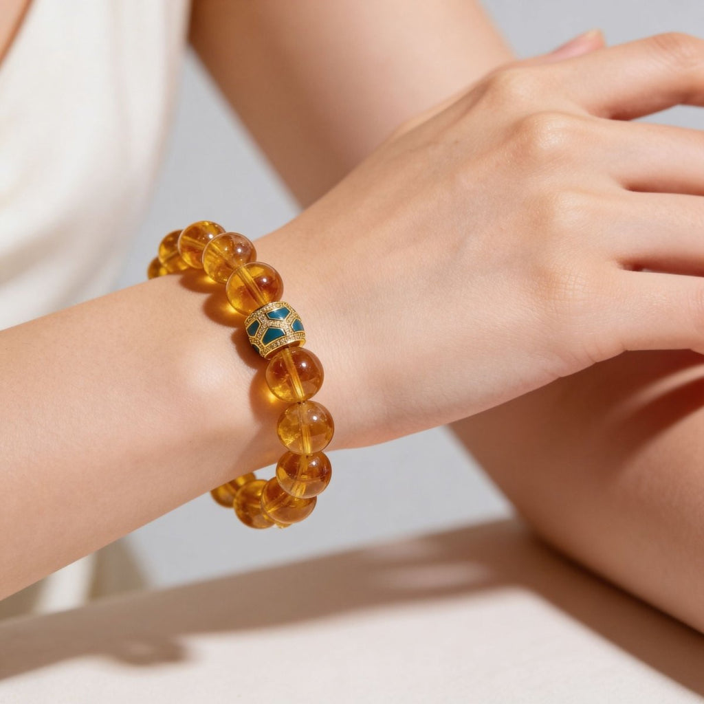Brazilian Citrine bracelet with green centerpiece worn by woman in natural light