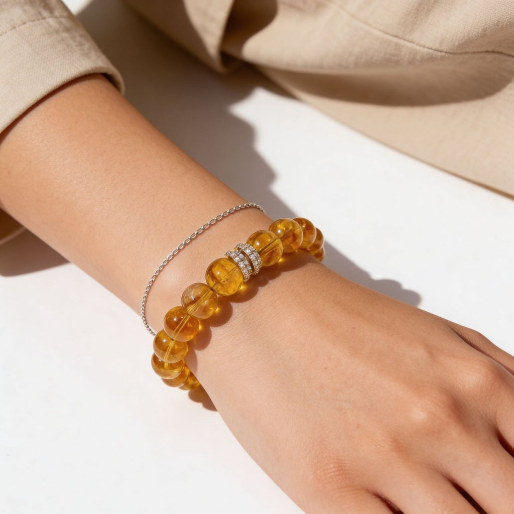 Natural Citrine bracelet worn on wrist with Gold Pavé Barrel centerpiece