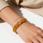 Natural Citrine bracelet worn on wrist with Gold Pavé Barrel centerpiece