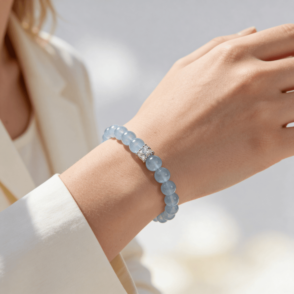 Coastal Elegance Aquamarine Bracelet worn on wrist with soft white sleeve