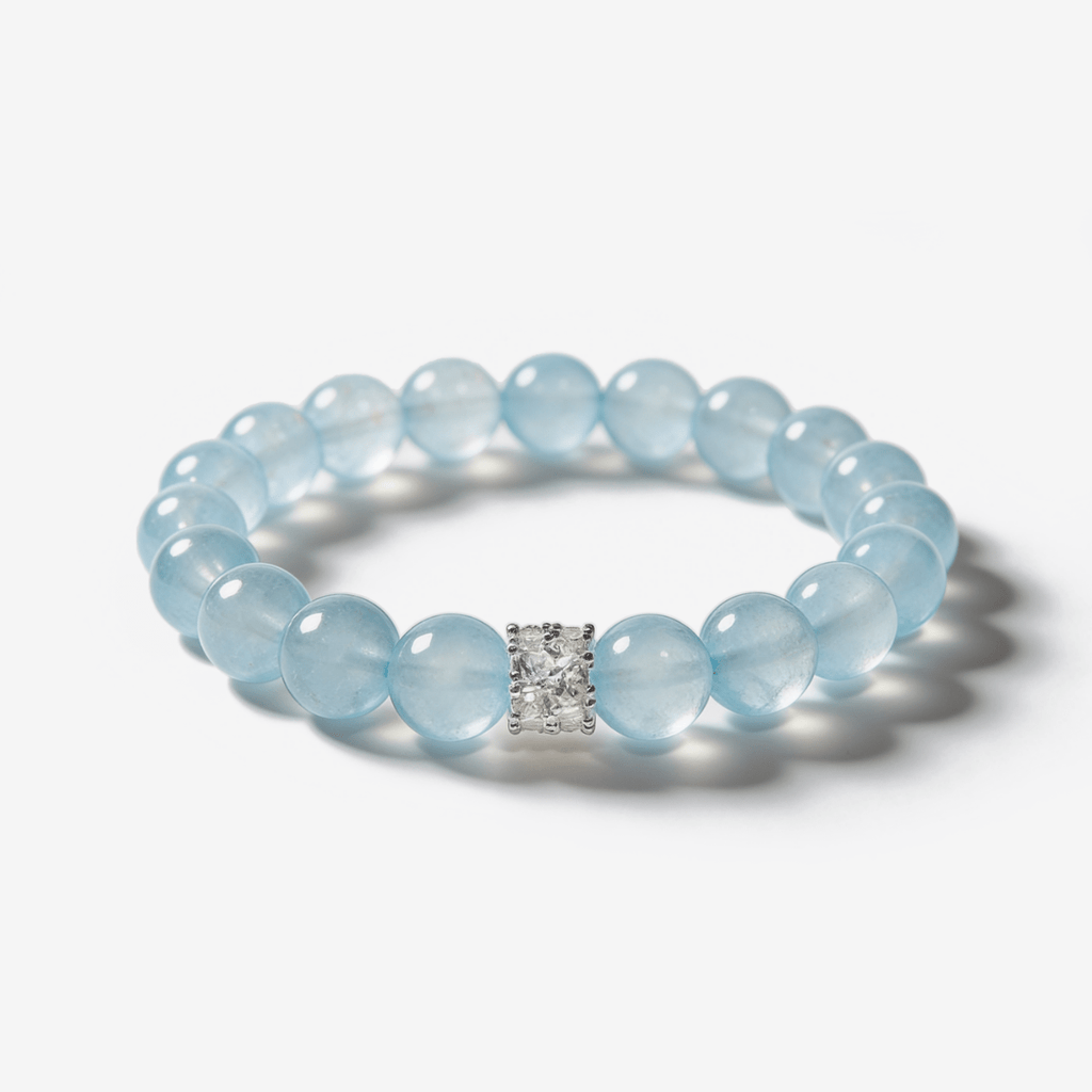 Natural aquamarine bracelet with 10mm blue crystal beads and cubic zirconia centerpiece