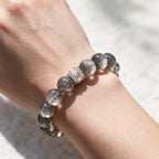 Silver Phantom Quartz bracelet worn on the wrist for understated everyday and day-to-evening styling