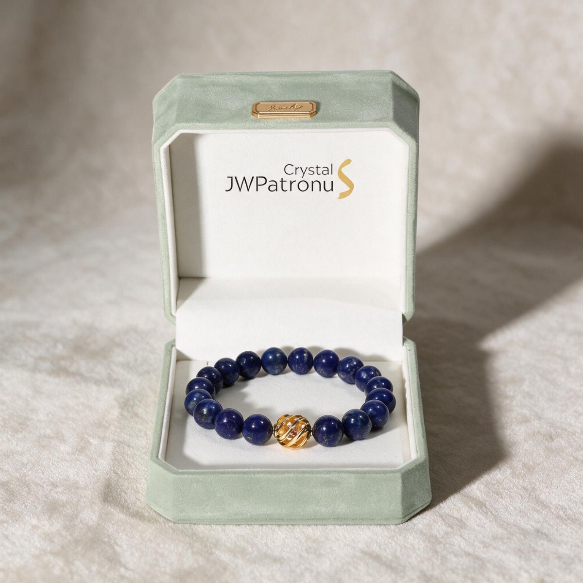 Golden Lucky Lapis Bracelet presented in an open JWPatronus keepsake gift box.