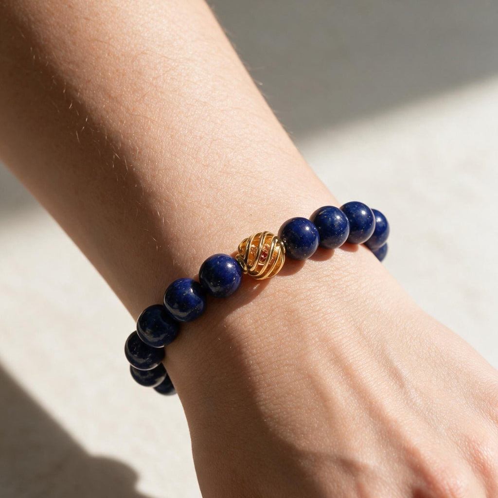 Golden Lucky Lapis Bracelet styled on the wrist in bright natural light.