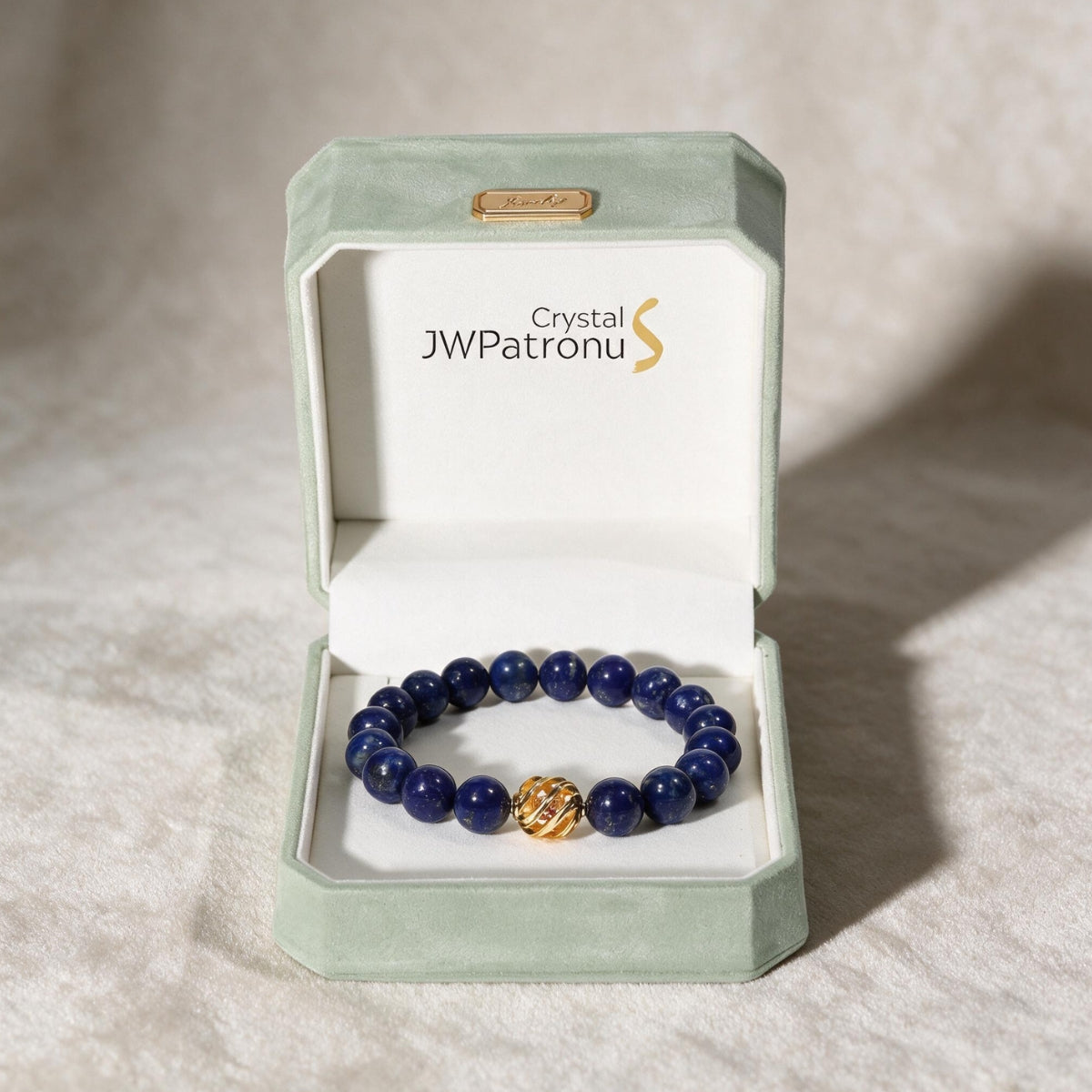 Golden Lucky Lapis Bracelet presented in an open JWPatronus keepsake gift box.