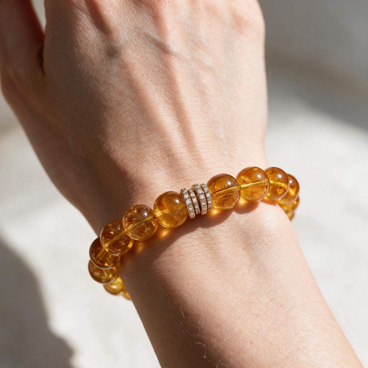 Gold Pavé Barrel Brazilian Citrine Bracelet styled on the wrist in natural light