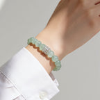Green Fluorite beaded bracelet styled with a white shirt for a clean everyday jewelry look