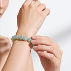 Natural Green Fluorite crystal bracelet on a woman’s wrist, a meaningful gift for her and everyday wear