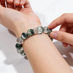 Green Phantom Quartz beaded bracelet on a woman’s wrist, a meaningful crystal jewelry gift for her