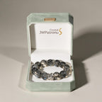 Guardian Black Rutilated Quartz Bracelet displayed in the JWPatronus signature keepsake gift box