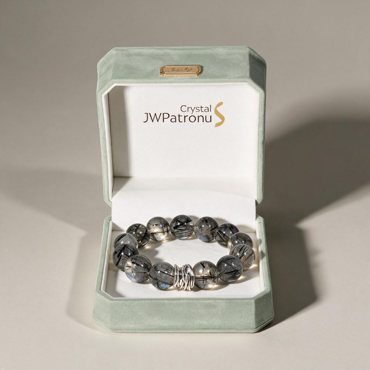 Guardian Black Rutilated Quartz Bracelet displayed in the JWPatronus signature keepsake gift box