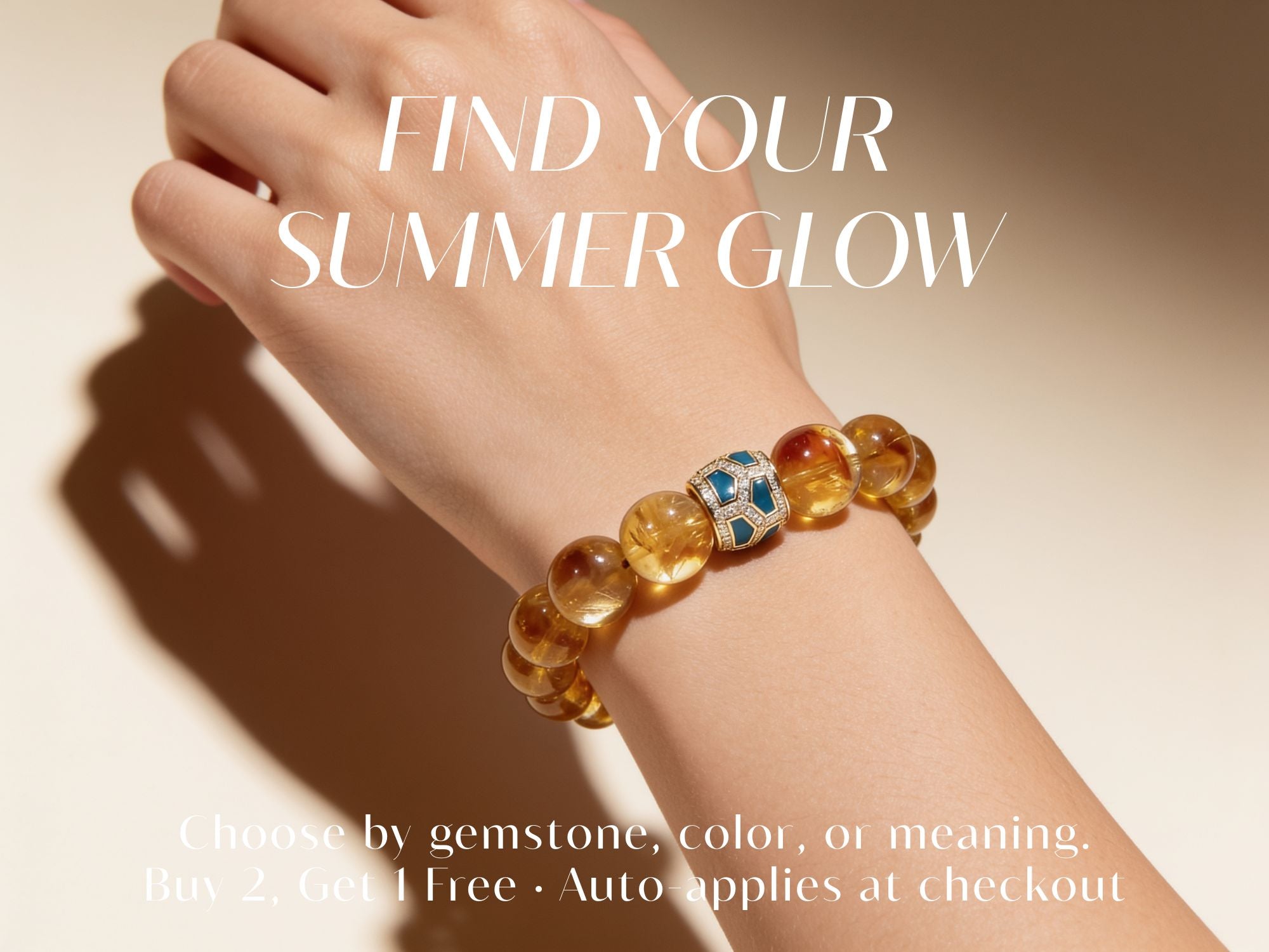 Natural citrine gemstone bracelet with a blue enamel centerpiece worn on the wrist for the JWPatronus Find Your Summer Glow collection.