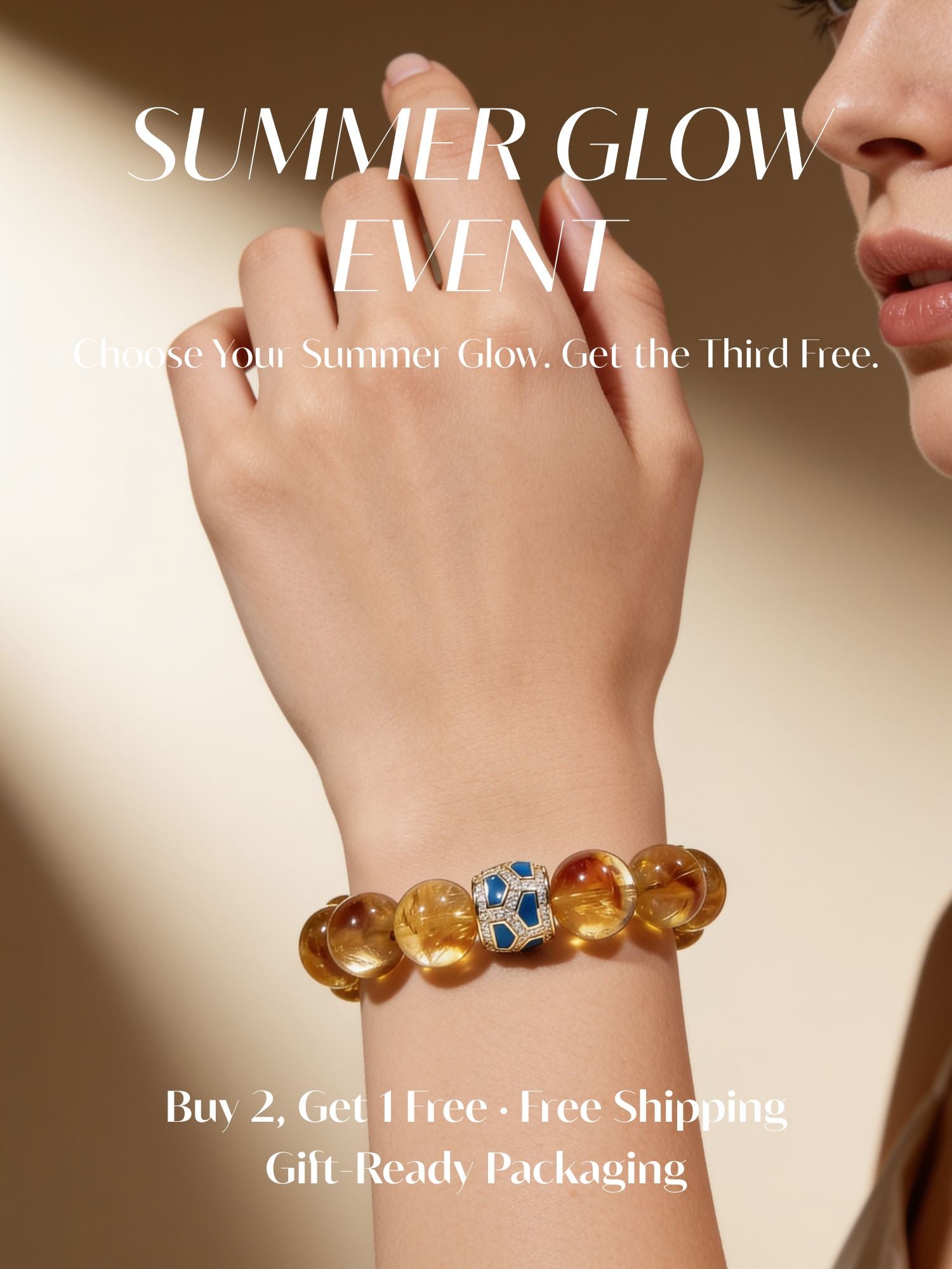 Woman wearing a natural citrine bracelet with a blue enamel centerpiece for the JWPatronus Summer Glow Event.