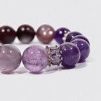 Close-up of the Lunar Grace bracelet’s lilac and mauve gemstone beads and sterling silver moon charm