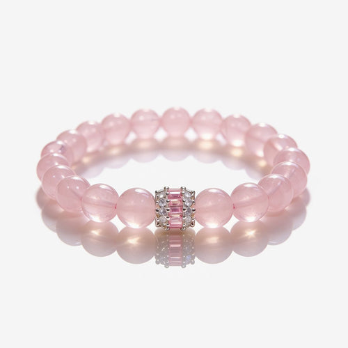 Madagascar Rose Quartz beaded bracelet with 10mm blush-pink beads and silver-tone pink baguette centerpiece
