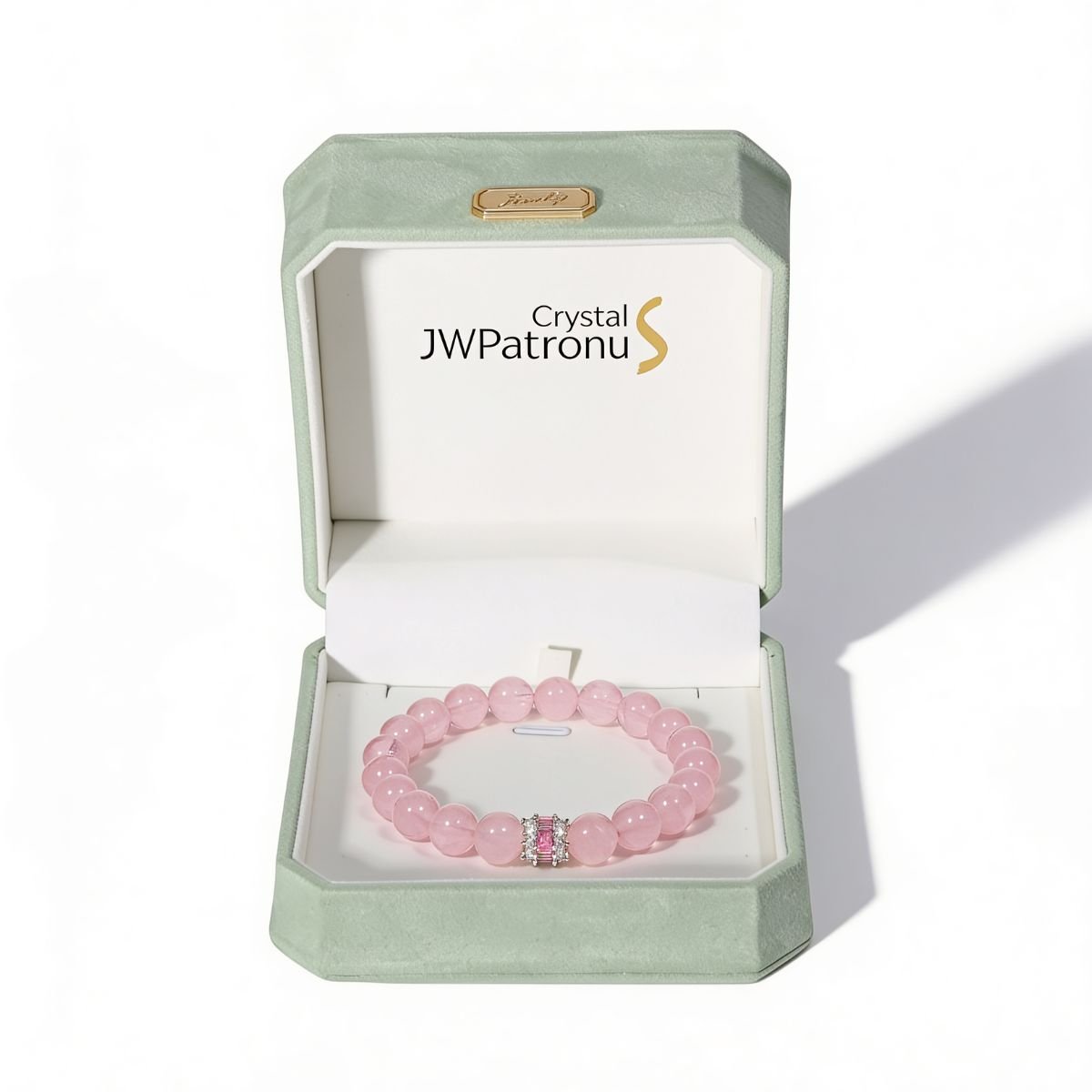 Madagascar Rose Quartz Beaded Bracelet with 10mm hand-polished blush-pink beads and a pink focal detail.