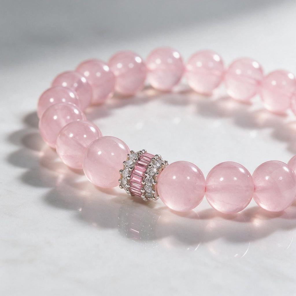 Detailed view of natural blush-pink Rose Quartz beads and their translucent variation