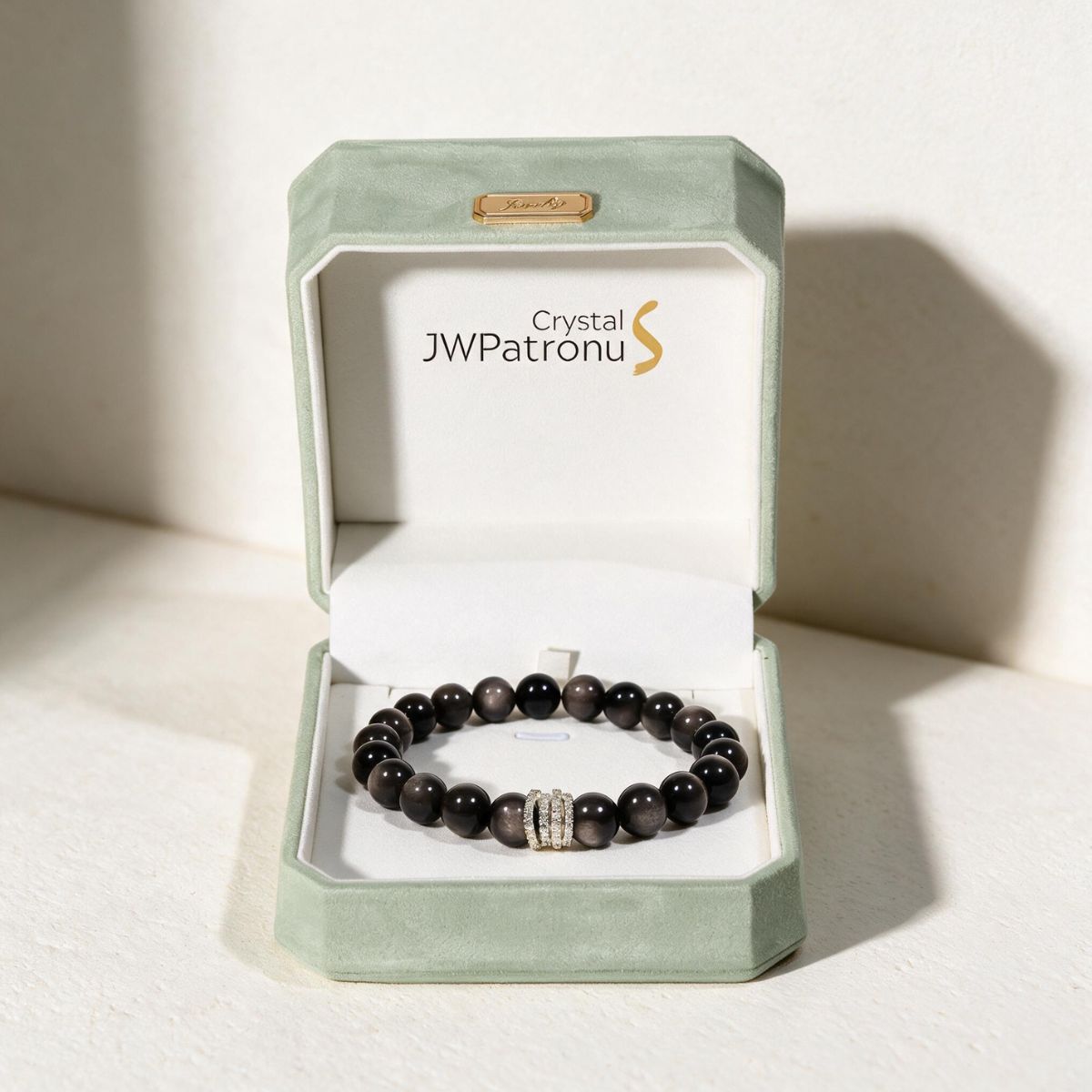 Midnight Shield Silver Sheen Obsidian bracelet presented in a JWPatronus keepsake jewelry box.