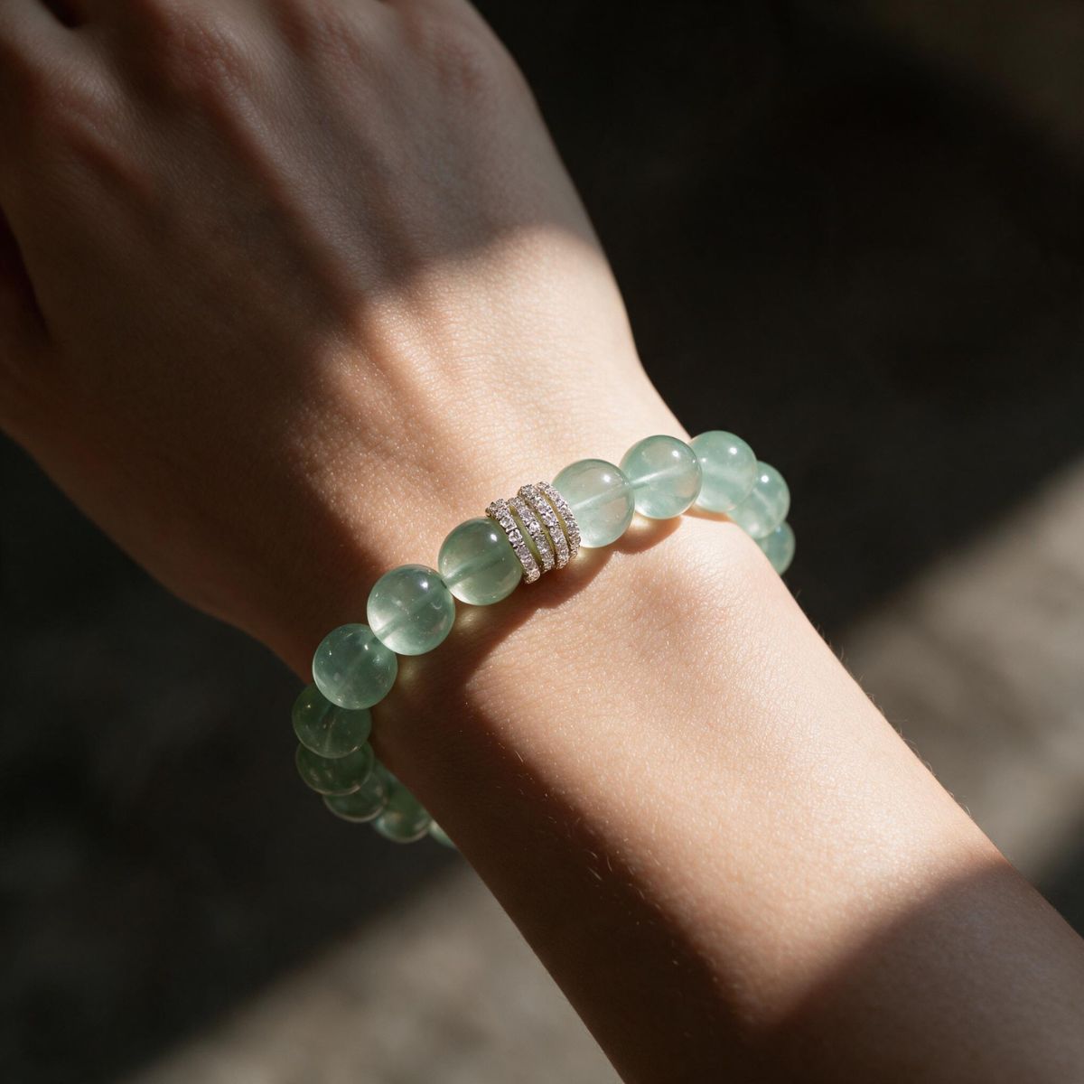Mint Clarity Green Fluorite bracelet worn on the wrist in soft natural light