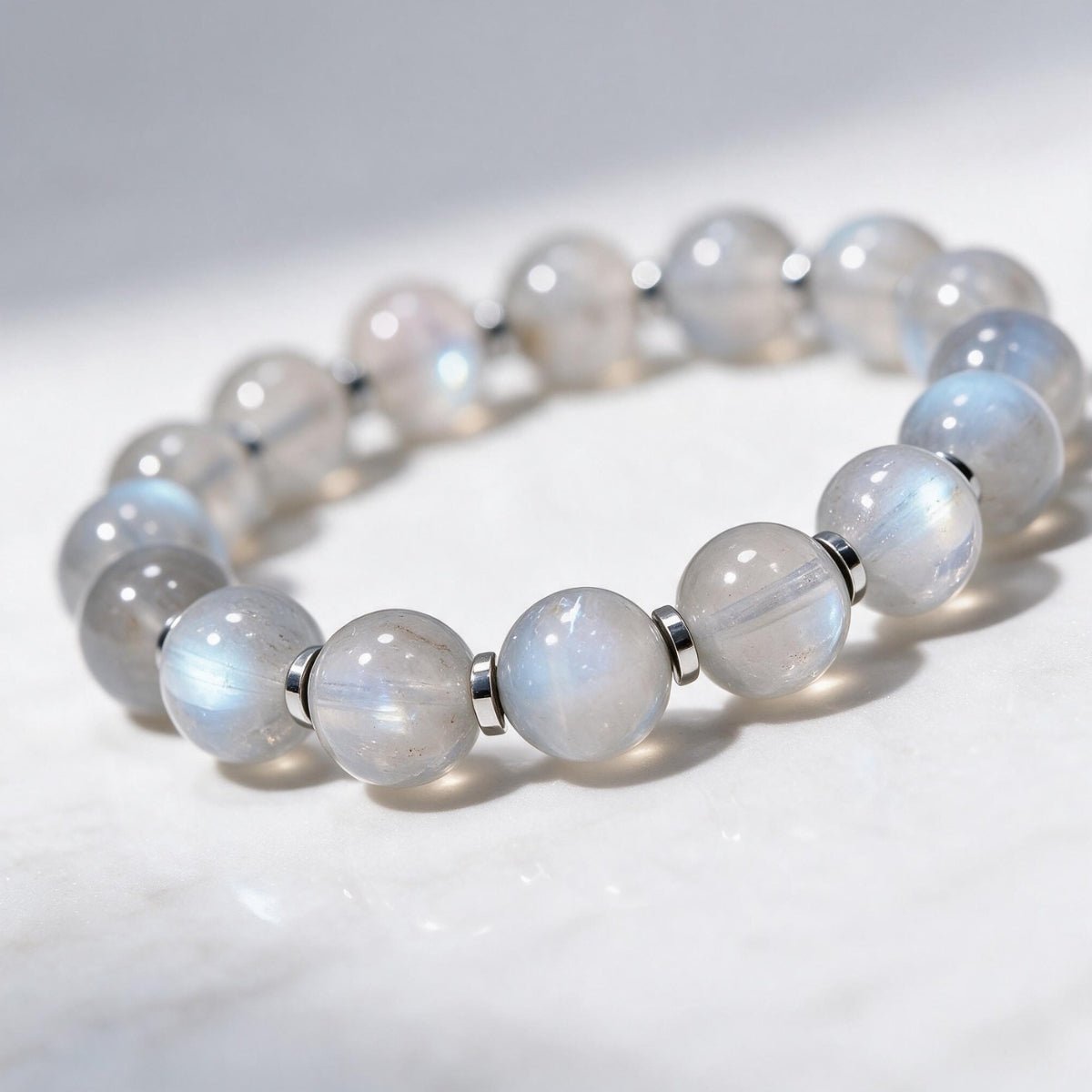 Natural 8mm moonstone bracelet with a clean continuous bead design on a white background