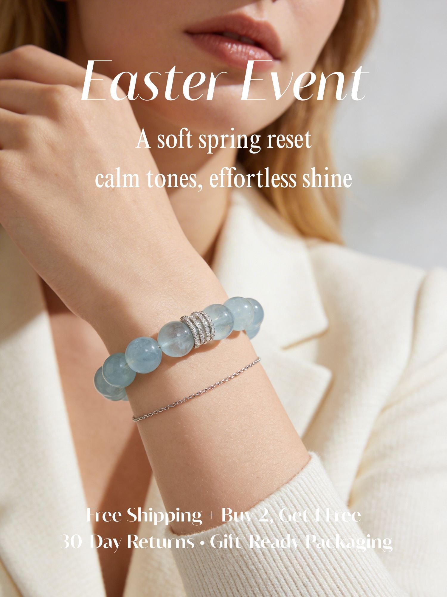 Woman wearing Ocean Calm Aquamarine beaded bracelet in a soft spring campaign image