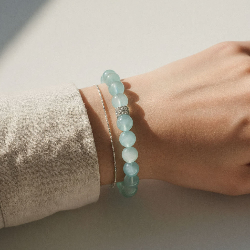 Ocean Calm Aquamarine Bracelet worn on wrist with soft neutral sweater
