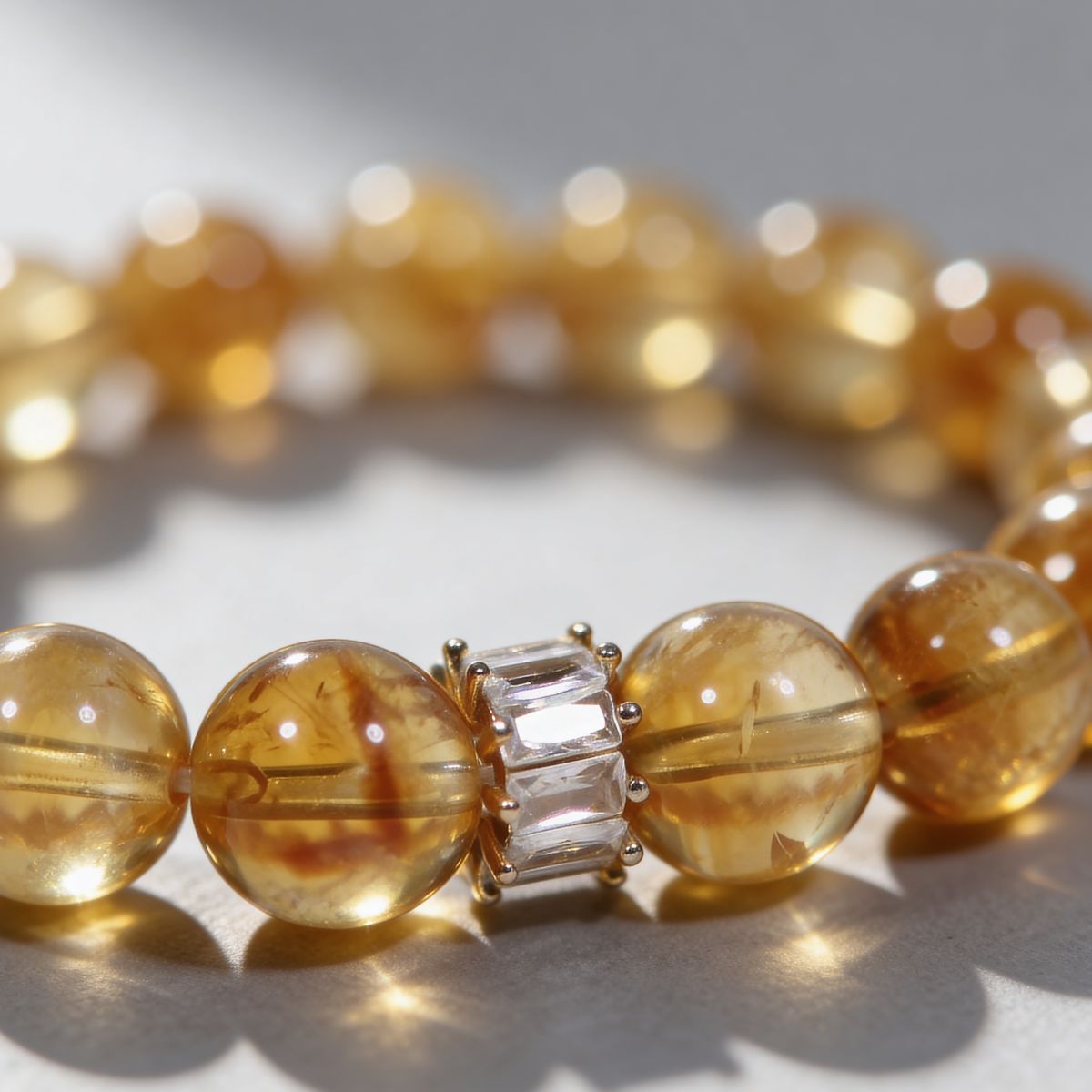 Citrine beaded bracelet close-up with golden beads and refined signature centerpiece