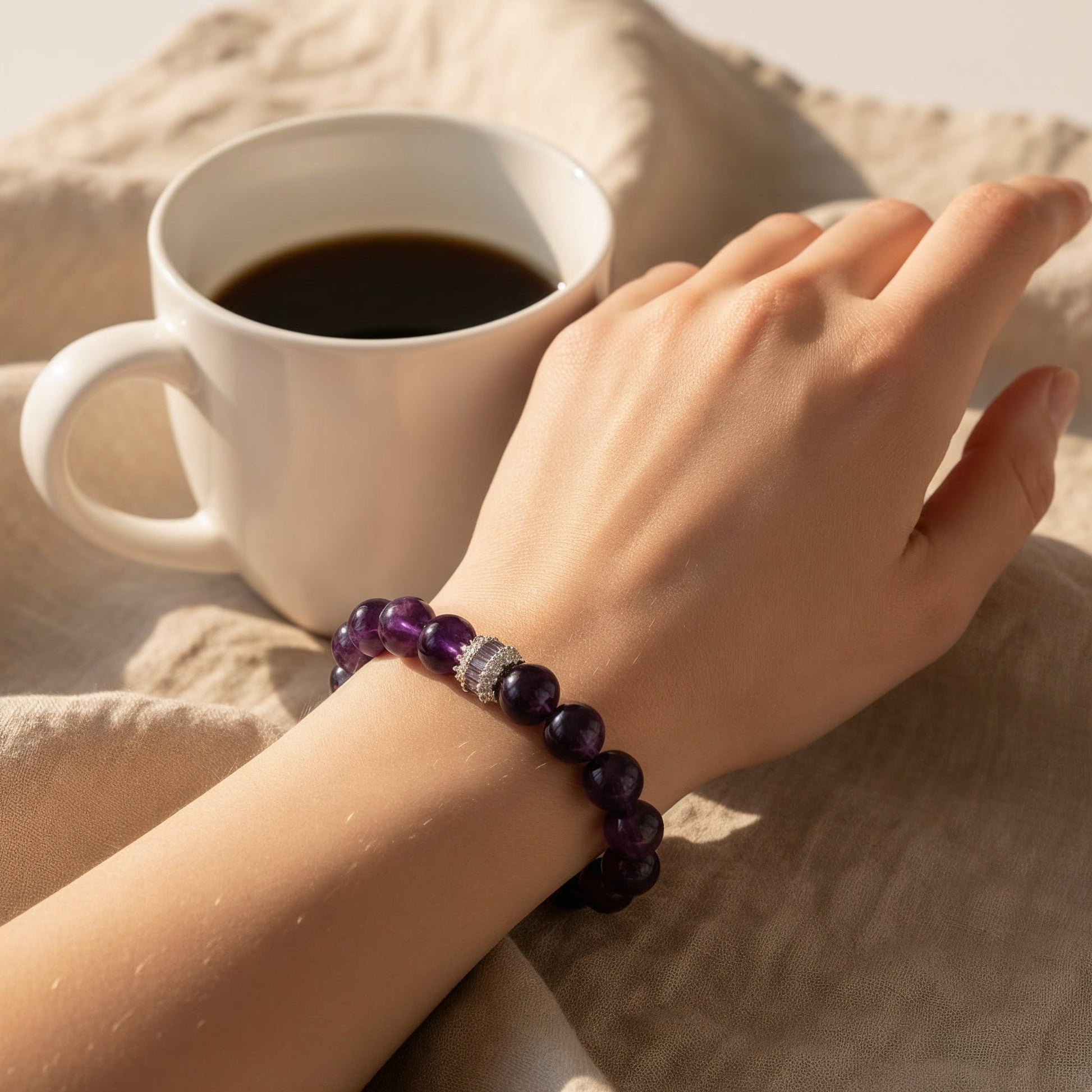 amethyst bracelet styled with coffee as everyday spiritual jewelry and anxiety crystal bracelet
