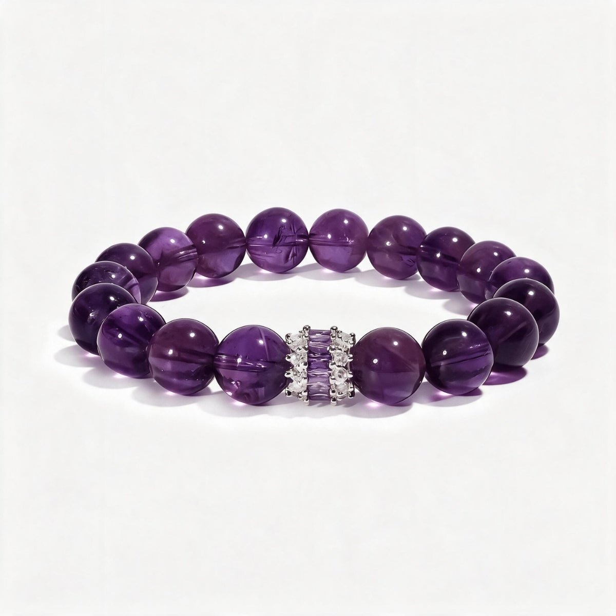 Royal Amethyst Elegance Bracelet with natural Sri Lankan amethyst beads and a refined inlaid centerpiece.