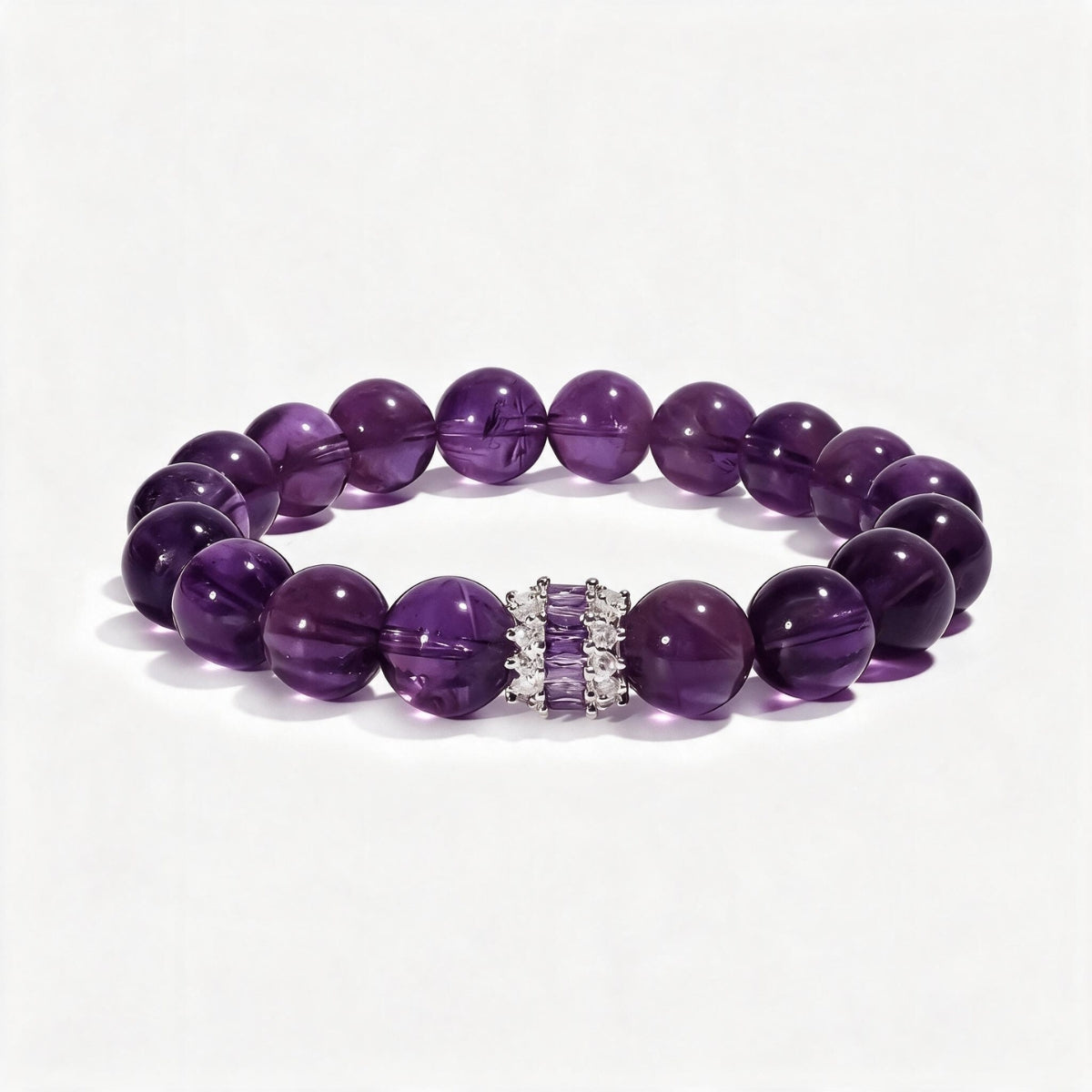 Royal Amethyst Elegance Bracelet with natural Sri Lankan amethyst beads and a refined inlaid centerpiece.