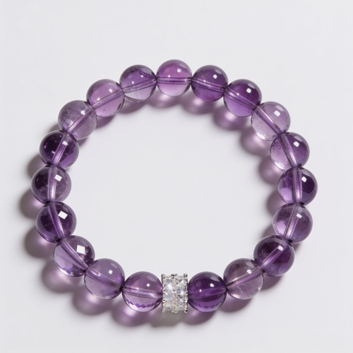 Top view of Serenity Bloom Amethyst Bracelet featuring natural Lavender Amethyst beads and a sterling silver centerpiece