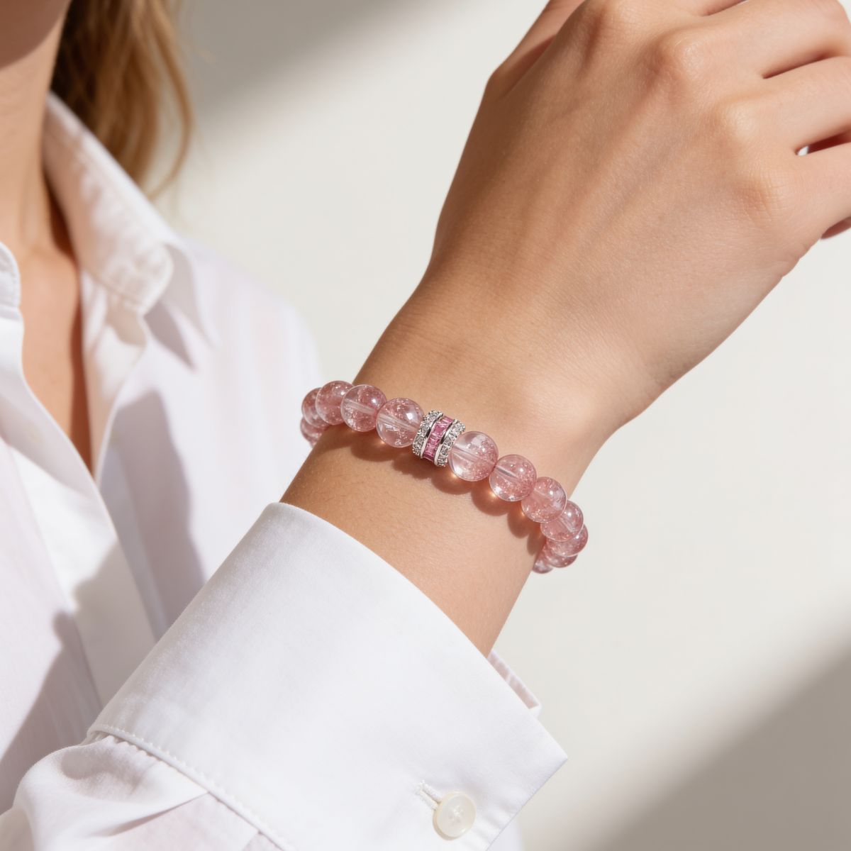 Strawberry Quartz beaded bracelet styled with a white shirt for a soft feminine everyday look